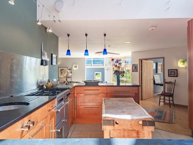 The kitchen successfully blends the contemporary with the traditional.