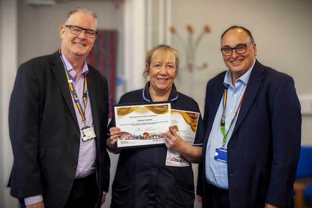 Pictured: Trust Chair, Paul Devlin, Pauline Roebuck and Trust Chief Exec, Ifti Majid.
