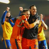 Goalkeepers Nathan Bishop and Marek Stech celebrate the victory at the end of the match against Rochdale. Photo by Chris Holloway/The Bigger Picture.media.