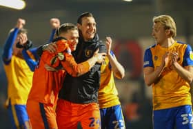 Goalkeepers Nathan Bishop and Marek Stech celebrate the victory at the end of the match against Rochdale. Photo by Chris Holloway/The Bigger Picture.media.