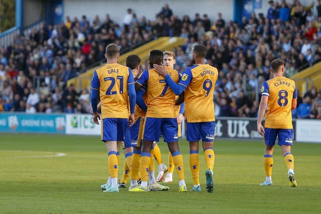 Mansfield Town forward Lucas Akins celebrates his first half goal. Picture by Chris HOLLOWAY / The Bigger Picture.media