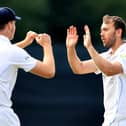 Alex Hughes celebrates with Ben Aitchison after taking the wicket of Tim Bresnan. (Photo by David Rogers/Getty Images)