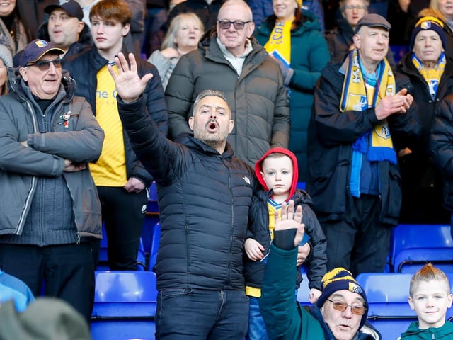 MansfieMansfield Town fans enjoy the win at Stockport County