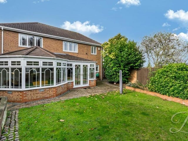 You've seen the front of the Forest Town house, now feast your eyes on the rear, as pictured from the garden, which combines a lawn and patio. Jutting our prominently from the house is the open-plan conservatory/diner.