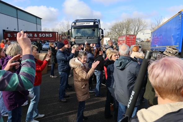 The crowds clap and cheer as one of the first loads of aid, driven by Mark Taylor and Peter Taylor, left Taylor's Transport Huthwaite depot. Scores of people had helped pack, sort and many had dropped by to donate even more  of the much needed essential items.