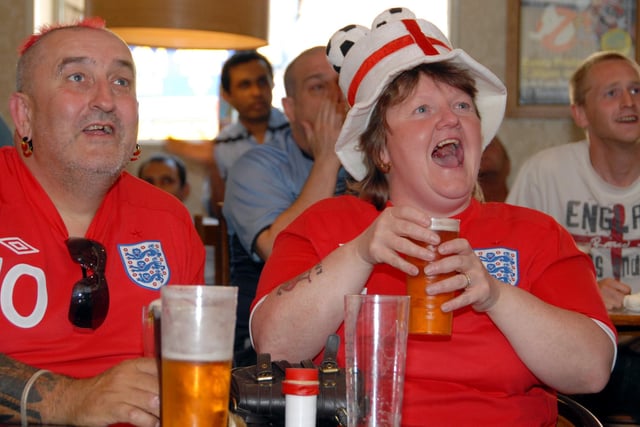 Fans watch World Cup England V Slovenia.