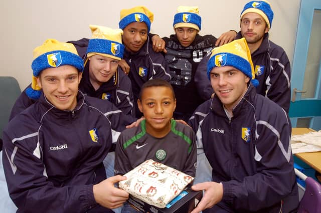 Lewis Chambers, who was an under13`s Stags Youth player in 2007, received a special visit from first team players in hospital as they delivered Christmas presents to Blandy Ward at King's Mill Hospital.