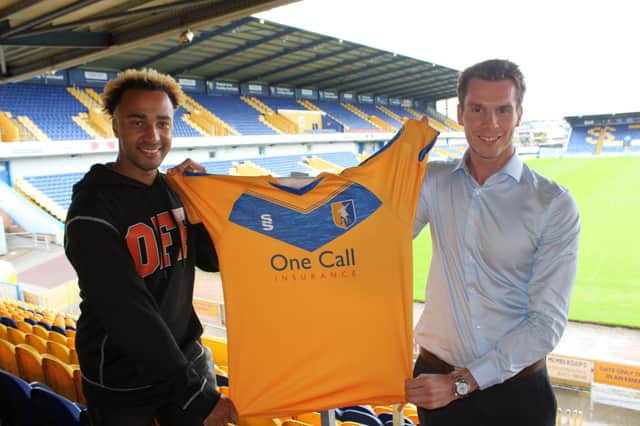 Striker Nicky Maynard with with Stags’ director of football David Sharpe. Photo: Mansfield Town