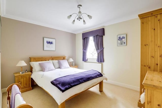 This is a bright, nay sparkling, bedroom, facing the back of the £950,000 property. Again, it benefits from a carpeted floor and coving to the ceiling.