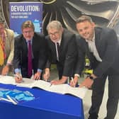 Council leaders sign the devolution deal, including Coun Ben Bradley, Mansfield MP and Nottinghamshire Council leader, right. Picture: Local Democracy Service