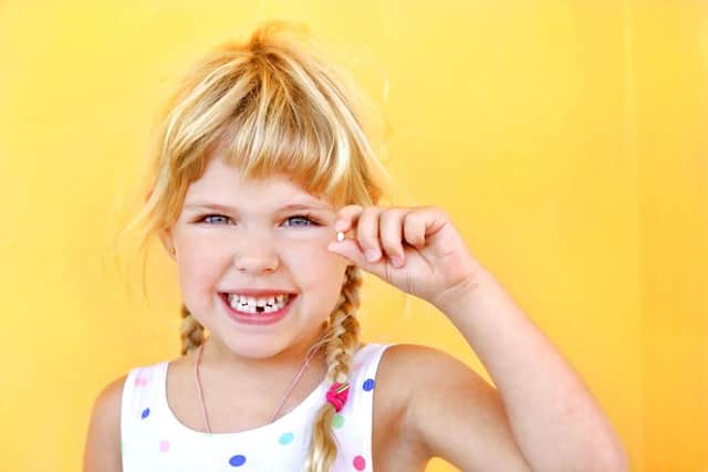 The Tooth Fairy pays differing amounts for teeth, depending on the child.