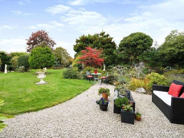 Here is one of the seating areas in the back garden, which a veritable sun trap.