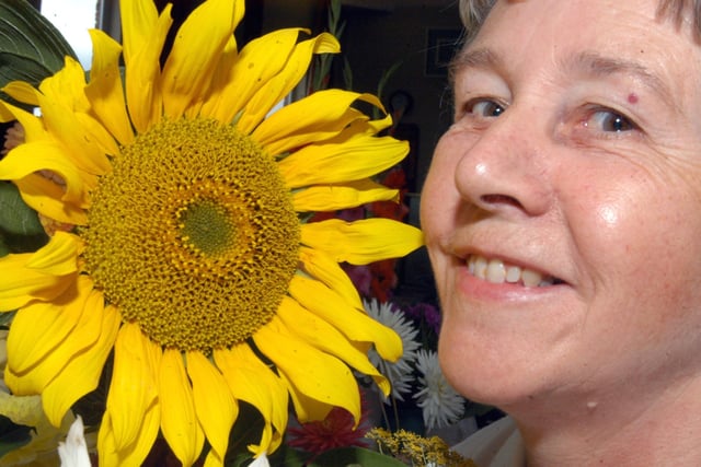 Jenny Frost, member of the Farnsfield Horticultural club, with her Sunflower at their summer show.