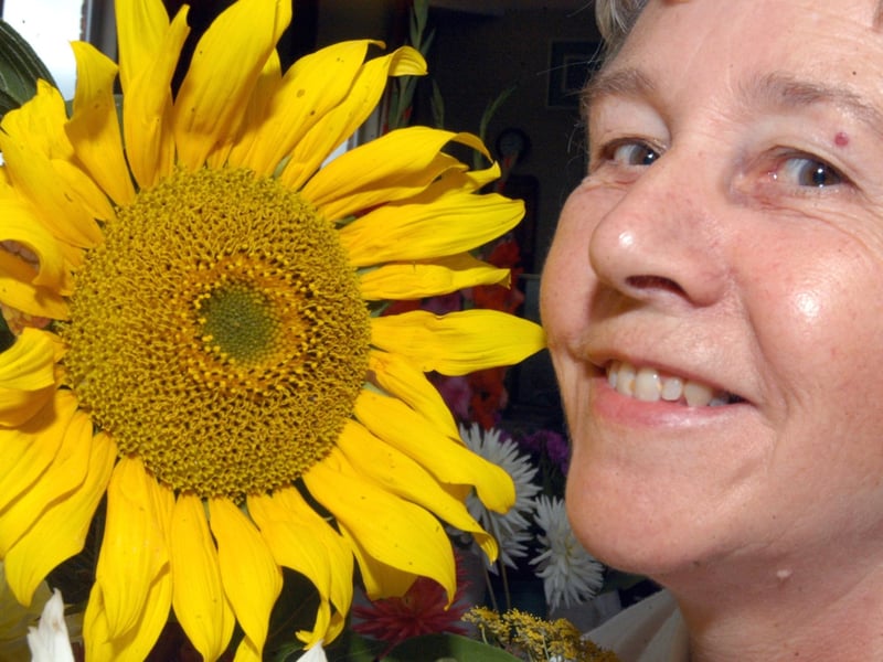 Jenny Frost, member of the Farnsfield Horticultural club, with her Sunflower at their summer show.