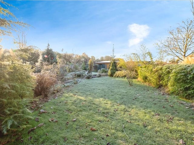 The property is set on a generous 1/3-acre plot