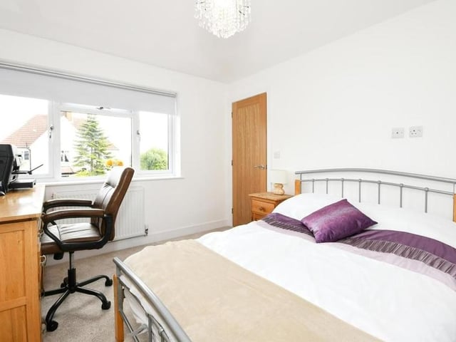 The second bedroom is a snug, attractive affair, overlooking the back garden. There is not only space for a double bed but also a desk and chair. The floor is carpeted.