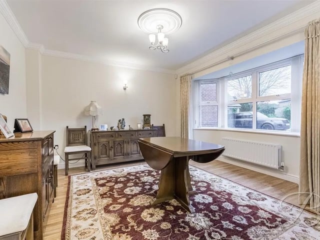 This room offers versatility to be utilised to your needs. With laminate flooring and a bay window to front elevation, perfect for entertaining.