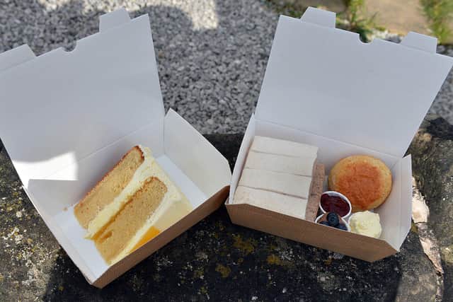 Gemma Lennane from Cakefield-Cakes Tea Room delivering afternoon tea.