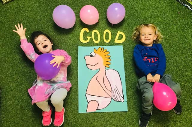Three-year-old Robin (left) and two-year-old Luca celebrate the 'Good' rating given to Cherubs Edwinstowe by Ofsted inspectors.