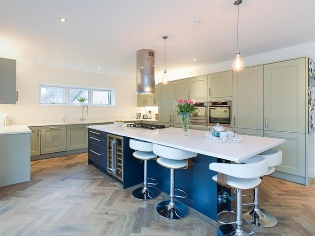The sleek kitchen area, modern in every way.