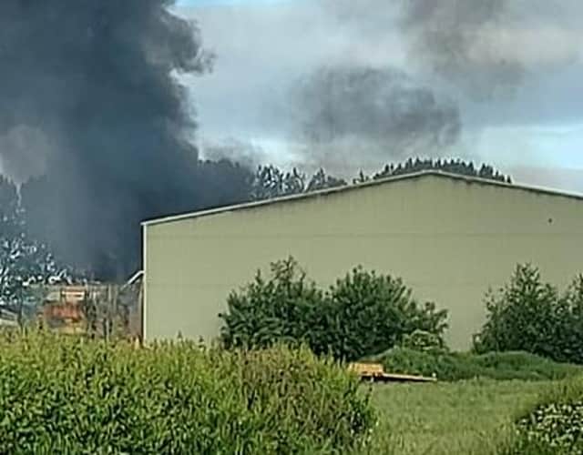 Thick black smoke at a wood recycling centre in Elkesly - the scene of the fire