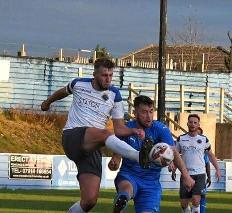 Sherwood goal scorer Charlie Taylor in action at Eccleshill.