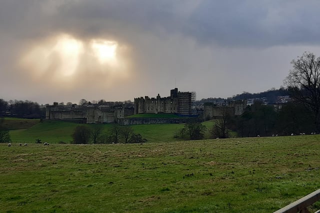A shaft of light over Alnwick Castle.