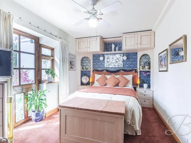 One of three bedrooms in the spacious property, ideal for family living.