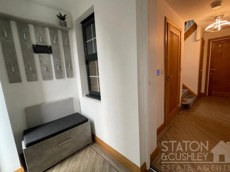 We launch our photo gallery with the entrance porch and hall, which greet you as you step in to the Sorrel Drive home.