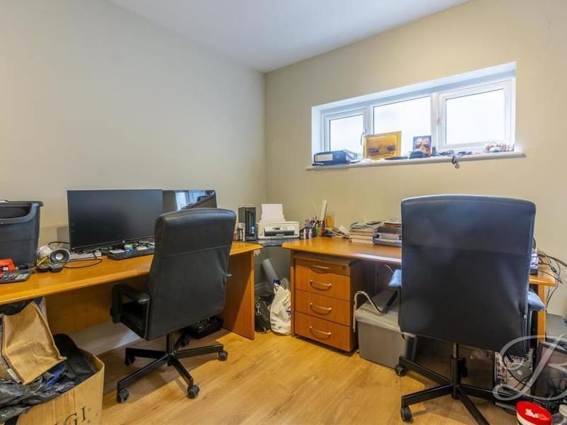 A bonus room on the ground floor of the £750,000-plus property is this study, which can also be used for storage.