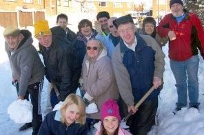 Residents from Darley Avenue in Kirkby get together to clear snow from their cul-de-sac to allow an ambulance through in December 2010.