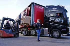 Bogusia Kavanagh with Alan Taylor MD of Taylors Transport and truck driver Mark Taylor, who is taking supplies to Poland.