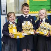 Pupils at St Joseph's were praised by Ofsted for their sense of duty, service and compassion. Here, some are pictured raising money for the BBC TV Children In Need appeal three years ago. (PHOTO BY: St Joseph's Catholic Primary School)