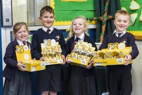 Pupils at St Joseph's were praised by Ofsted for their sense of duty, service and compassion. Here, some are pictured raising money for the BBC TV Children In Need appeal three years ago. (PHOTO BY: St Joseph's Catholic Primary School)