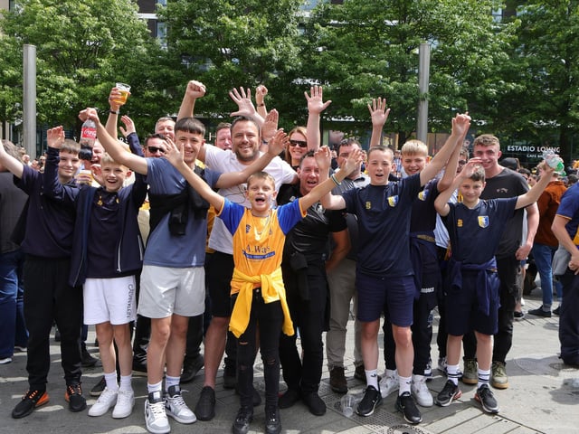 Mansfield Town fans soak up the Wembley atmosphere.