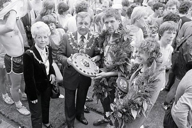 Mansfield Fun Run from 1981. Council Chairman Brian Marshall presents the prizes.