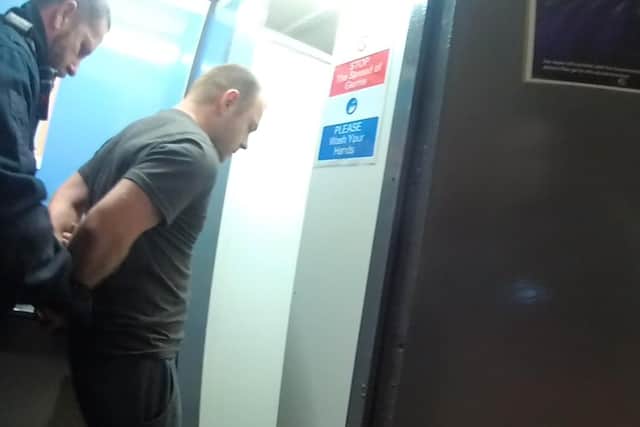 John Jessop being arrested at his workplace for the murder of Clair Ablewhite