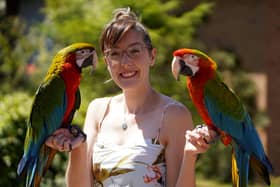 Chloe Brown, of Kirkby, and her parrots, Motley, left, and Echo, that she takes to fly in the Peak District.