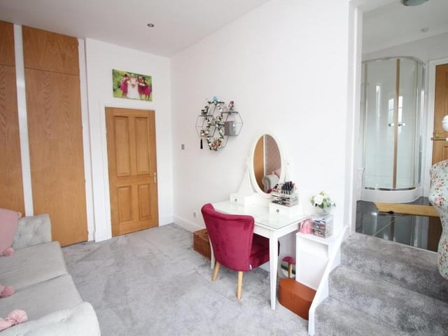 This bedroom also has 'Jack And Jill' access to the same en suite bathroom as bedroom two. It boasts fitted wardrobes too, plus ceiling spotlights.