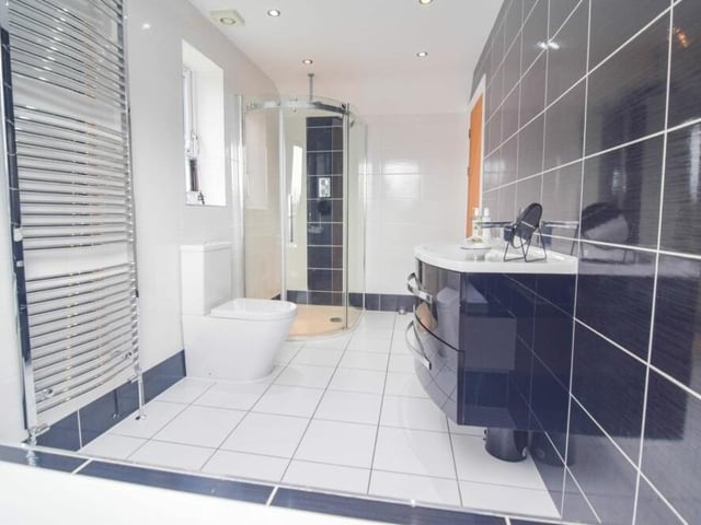 A second shot of one of the squeaky-clean bathrooms at the Hawksworth Avenue house.