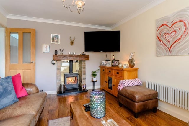 Radiating warmth, the lounge also features an inset dual log-burner with granite hearth. A night in front of the TV has rarely looked so appealing.