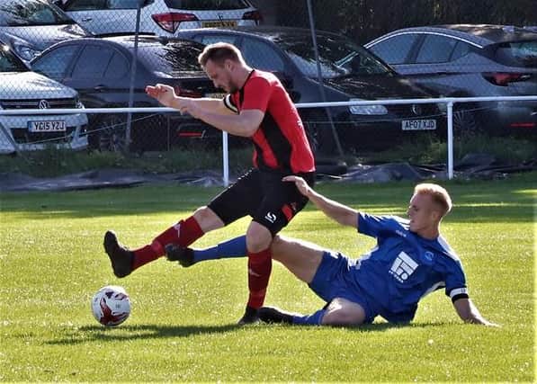 Ollerton Town captain Sam Stretton is urging the FA to be sensible and move the club into a better geographical league.