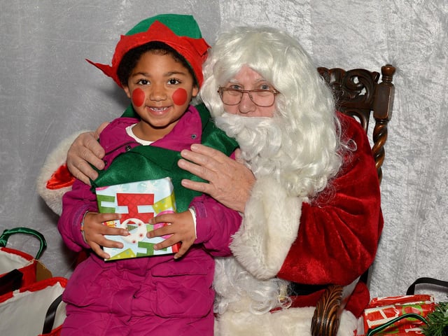 Sutton In Ashfield Christmas lights switch on, pictured is six-year-old Sapphire Sima with Santa in 2018.