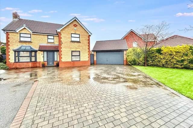 The spacious property boasts a garage and driveway offering off road parking