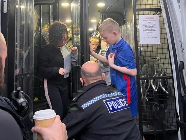 The children and young people got to inspect the back of a police van, complete with mini custody cell.
