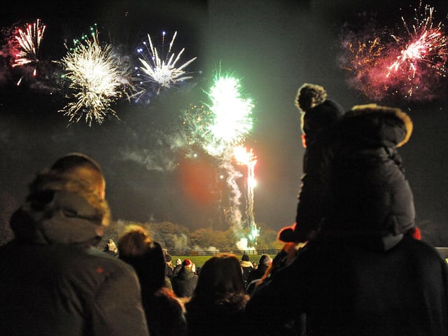 The fireworks light up the sky