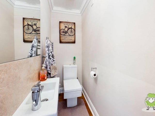 Even this downstairs cloakroom is beautifully presented at the Mansfield Woodhouse property, with WC and wash hand basin.