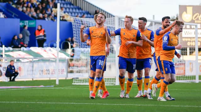 Mansfield Town forward Rhys Oates celebrates his first half goal. Pic: Chris Holloway / The Bigger Picture.media