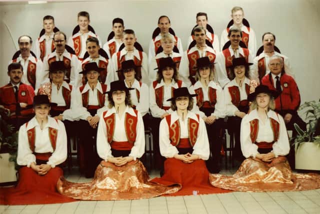 An old photo of the Derby Serenaders carnival band. David is pictured on the back row, second from left. Moz is the second row from the front, far-right (in red jacket).