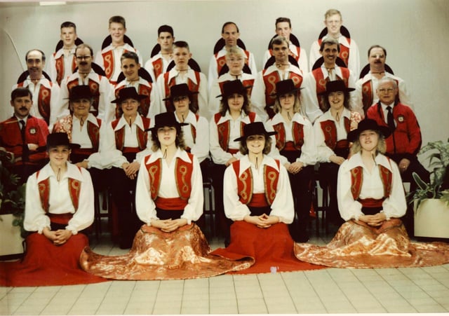 An old photo of the Derby Serenaders carnival band. David is pictured on the back row, second from left. Moz is the second row from the front, far-right (in red jacket).